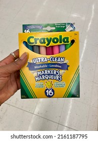 Edmonton, Canada - May 13, 2022: A Black Person Holding A Box Of Crayola Ultra Clean, Washable Markers