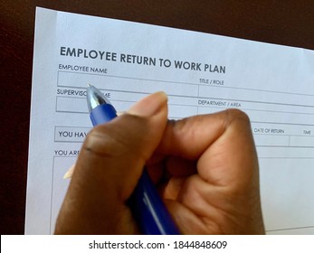 Edmonton, Canada - October 27, 2020: A Concept Image Of A Black Person Completing An Employee Return To Work Plan