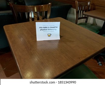 Edmonton, Canada - September 3, 2020: A Note Stating This Table Is Closed For Physical Distancing In A Second Cup Cafe