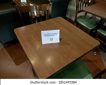 Edmonton, Canada - September 3, 2020: A Note Stating This Table Is Closed For Physical Distancing In A Second Cup Cafe