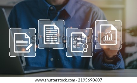 E-document management concept.Businessman working on laptop computer with electronics document icons.ERP.online documentation database,records keeping,file access, doc sharing.