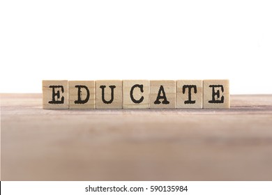 Educate Word Written In Wooden Cube