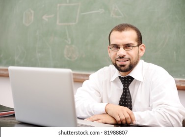 Education activities in classroom at school, Happy teacher with laptop