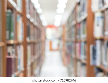 Education blur background of books on bookshelf in blurry school library, study room or classroom