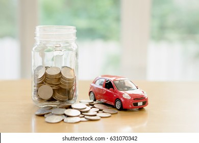 Education Budget Concept. Car Money Savings In A Glass