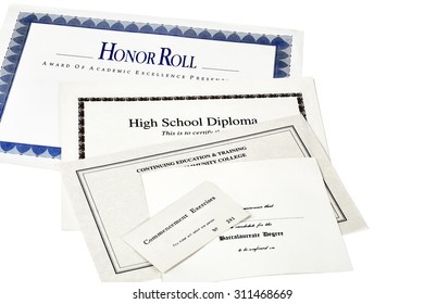 Education Certification Documents Including High School Diploma,commencement Ticket, Continuing Education Certificate And Honor Roll Certificate  Isolated On White