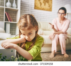 the education of the child. mother scolds her child girl. family relationships - Shutterstock ID 371509258