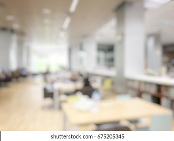 Education Concept With Blurred Image Background Of Student Reading In Modern Library For Relax Education In University. Lifestyle Knowledge And Learning Concept.