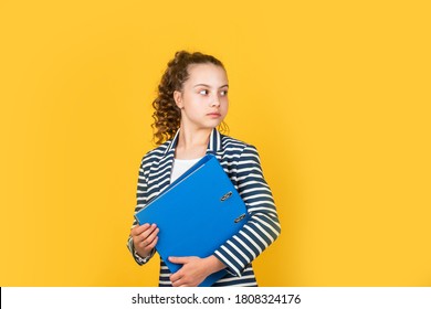 Education Concept. Happy Girl Hold Library Folder. School Library. Knowledge And Information. Library Assistant. Student Teen Formal Style. Administrative. Coordinator And Project Management.