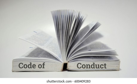 Education concept. Open book and word code of conduct on white background - Shutterstock ID 600409283
