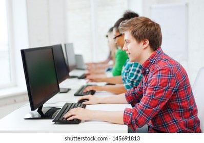 Education Concept - Student With Computer Studying At School