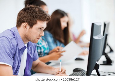 Education Concept - Student With Computer Studying At School