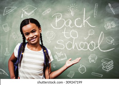 Education doodles against portrait of cute little girl in classroom - Powered by Shutterstock