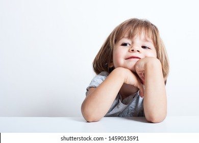 Education, Elementary School, Technology, Advertisement And Children Concept -  Funny Schoolchild Girl With Tablet,iPad,pc And Notebook, Diary On A White Background. Girl Ready To Study. Copy Space