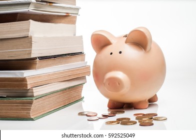 education financial saving piggy bank money books - Shutterstock ID 592525049