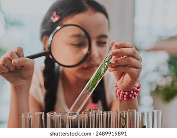 Education, girl and magnifying glass in home with plant test tube and curiosity for knowledge. Child, science project and lens for closer look for growth, development and learning in living room - Powered by Shutterstock