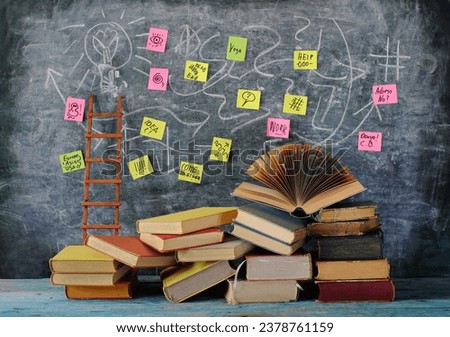 Education gives orientation,books,blackboard and ladder of success.Learning,knowledge,humanism, back to school concept