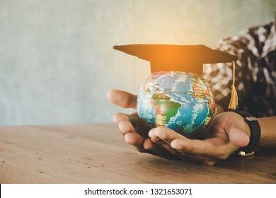 Education in Global world, Graduation cap on Businessman holding Earth globe model map with Radar background in hands. Concept of global business study, abroad educational, Back to School. - Powered by Shutterstock