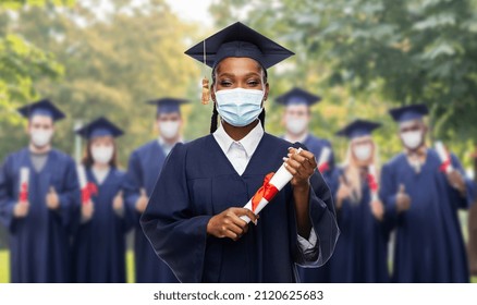 Education, Graduation And Pandemic Concept - Graduate Student Woman In Mortarboard And Bachelor Gown With Diploma Wearing Protective Mask Over Group Of People On Background