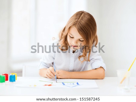 Similar – Image, Stock Photo Little girl painting a picture at home