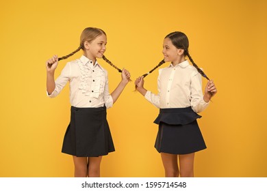 Education is step by step process of getting knowledge. Classmates having fun at school. Friends adorable pupils. Schoolgirls formal style school uniform. Happy childhood. School education concept.