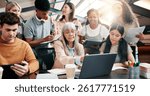 Education, students and lecturer with laptop, explaining and info for assignment in classroom and group. Knowledge, teacher and mature woman with advice for project, people and planning in university
