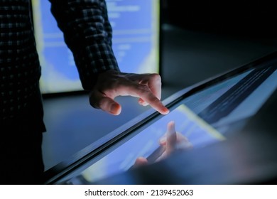 Education And Technology Concept - Man Using Interactive Touchscreen Display Of Electronic Kiosk At Modern History Museum