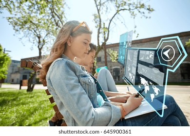 Education, Technology And People Concept - Group Of Students With Smartphone And Notebooks Outdoors