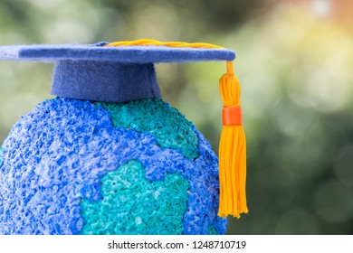 Education World Or Graduated Study Abroad International Ideas. Graduation Hat On Top Paper Mache Craft Earth Globe. Concept Of Congratulations To Graduates University Lead To Success In World Amd Life