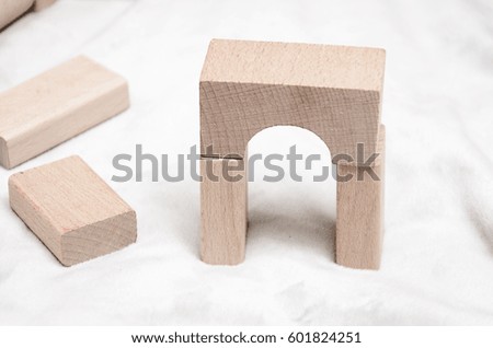 Educational blocks made of natural wood with soft light