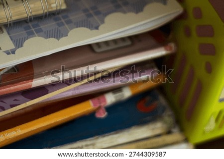 Educational Book Pile Symbolizing Knowledge and Reading