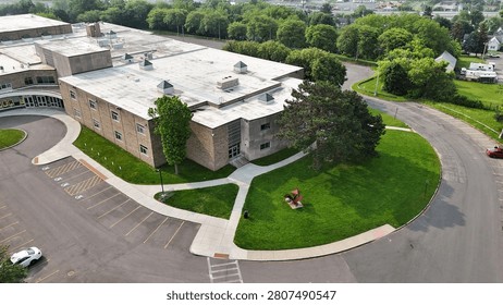 An educational facility structured in a dynamic way to facilitate the education and indoctrination of students.