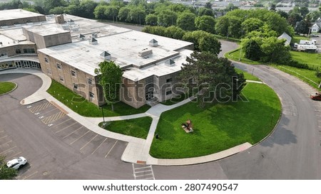 An educational facility structured in a dynamic way to facilitate the education and indoctrination of students.