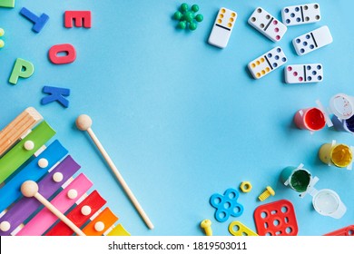 Educational Logic Games. Preschool Learning Toys. School supplies, stationery on blue background. Top view colorful background. Flat lay