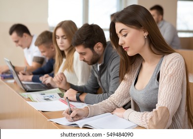 Educational Process. Group Of Young People Studying In University Sitting In Auditorium During Lecture Education Students College University Studying Youth Campus Friendship Teenager Teens Concept 