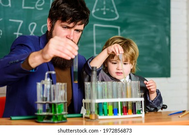 Educational School Program. Schoolboy Cute Child Experimenting With Liquids. Teacher And Child Test Tubes. School Lesson. Perseverance Pays Off. Chemical Experiment. Symptoms Of ADHD At School