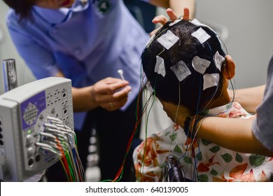 EEG Electrode Placement To Patient During EEG Record, Electroencephalogram (EEG)