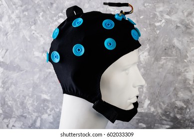 EEG Electrodes Attached To Model  Head. EEG Headset Equipment Close Up