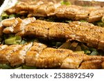 eels split and broiled[grilled] in soy, broiled eels