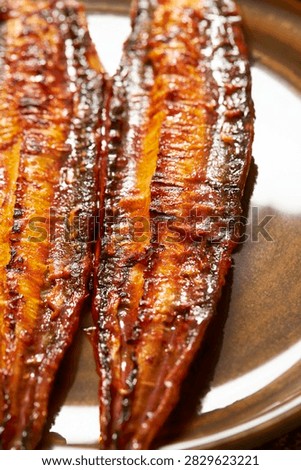 eels split and broiled[grilled] in soy, broiled eels