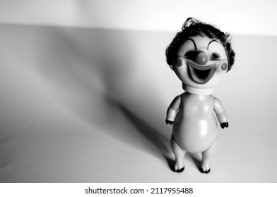 eerie black and white Doll - studio portrait session 
