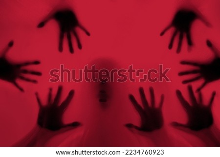 eerie blurry hands of people as if have been trapped behind glass, dense fabric, ghost, viva magenta, hot pink texture composition, copy space, fashion color trends 2023, nightmares, halloween horror