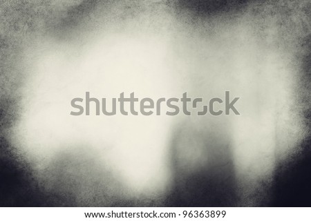 An eerie Image is a composite of my photos. No filters have been used. black and white grunge texture or background with space for text or image.