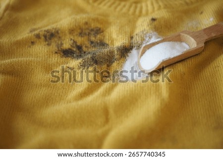 Effective cleaning method for stains on yellow fabric