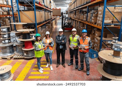 Effective Management in Action: Businessman Engaging and walking with Warehouse Worker and Engineer, Utilizing Digital Tablet - Powered by Shutterstock