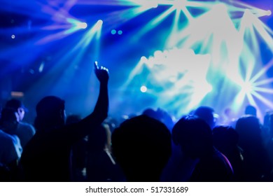 Effects blur Concert, disco dj party. People with hands up having fun - Shutterstock ID 517331689