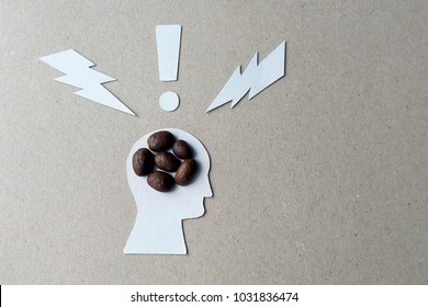 The effects of caffeine on the brain image from coffee beans, cardboard and white paper                               