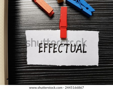 effectual writting on table background.