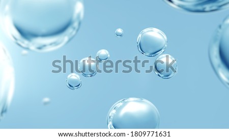 Effervescent fizz and clean cosmetics hygiene or rejuvenate renewable energy. Studio shot of transparent cosmetic blue gas bubbles under water in full-frame macro close up with selective focus blur. 