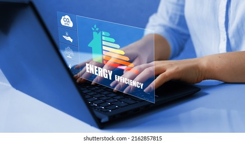 Efficiency Energy Rating Concept.Sustainable Development And Eco House. Ecological House With Low Consumption On Renovation With Insulation. 